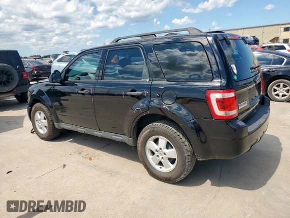 2012 Ford Escape XLS with VIN 1FMCU0C7XCKC81240, listed as a Copart auction lot 60207255 with 82,443 mi miles and Salvage title. Bid and sale history available at DreamBid. Image 2.