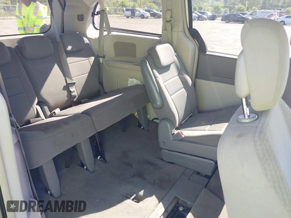2010 Chrysler Town & Country Touring with VIN 2A4RR5D11AR493086, listed as a IAAI auction lot 42012604 with 154,204 mi miles and . Bid and sale history available at DreamBid. Image 8.