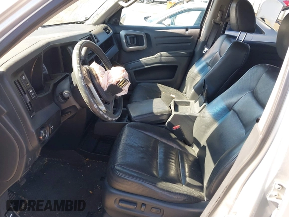 2012 Honda Ridgeline RTL with VIN 5FPYK1F56CB457687, listed as a IAAI auction lot 42582331 with 96,357 mi miles and . Bid and sale history available at DreamBid. Image 5.