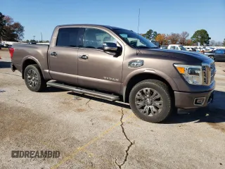 2017 Nissan Titan SL z VIN 1N6AA1E54HN512447, wystawiony jako Copart lot #85330734 z przebiegiem 119 424 mil mil oraz Czysty tytuł • Clean title. Historia ofert i sprzedaży dostępna na DreamBid. Obrazek 4.