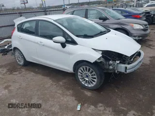 2015 Ford Fiesta S z VIN 3FADP4TJ1FM138800, wystawiony jako IAAI lot #41830043 z przebiegiem 105 228 mil mil oraz . Historia ofert i sprzedaży dostępna na DreamBid. Obrazek 1.