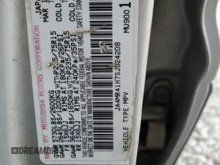 1995 Mitsubishi Montero z VIN JA4MR41H7SJ024208, wystawiony jako Copart lot #42971825 z przebiegiem 313 990 mil mil oraz Szkoda całkowita • Salvage title. Historia ofert i sprzedaży dostępna na DreamBid. Obrazek 14.