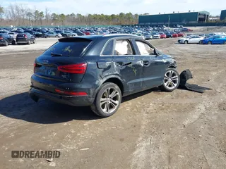 2015 Audi Q3 Premium Plus z VIN WA1EFCFS4FR001441, wystawiony jako IAAI lot #41813239 z przebiegiem 112 795 mil mil oraz . Historia ofert i sprzedaży dostępna na DreamBid. Obrazek 4.
