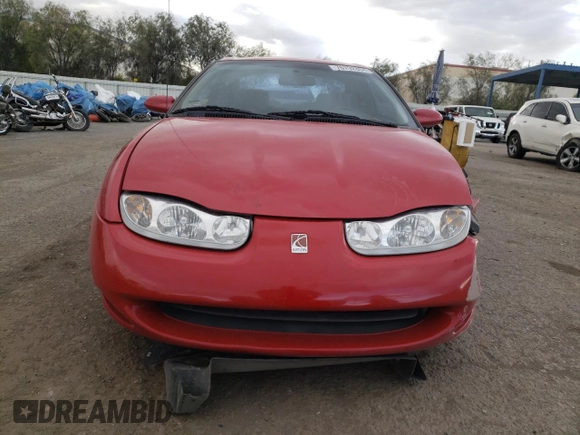2001 Saturn SC z VIN 1G8ZY12701Z201761, wystawiony jako Copart lot #76792804 z przebiegiem 85 352 mil mil oraz Szkody całkowita. Historia ofert i sprzedaży dostępna na DreamBid. Obrazek 5.