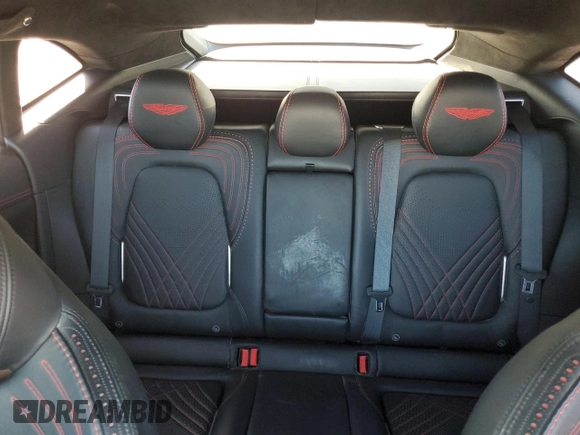 2021 Aston Martin DBX z VIN SCFVUJAW8MTV02134, wystawiony jako Copart lot #72456004 z przebiegiem Nie podano mil oraz Szkoda całkowita • Salvage title. Historia ofert i sprzedaży dostępna na DreamBid. Obrazek 10.