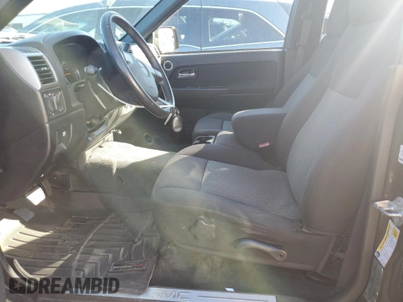 2011 GMC Canyon SLE1 with VIN 1GTH6MFE1B8128778, listed as a Copart auction lot 72456434 with 63,849 mi miles and Salvage Title. Bid and sale history available at carsss.com. Image 7.