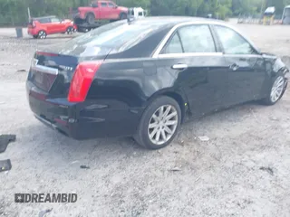 2016 Cadillac CTS RWD with VIN 1G6AP5SX0G0118831, listed as a IAAI auction lot 42105091 with 123,507 mi miles and . Bid and sale history available at DreamBid. Image 4.