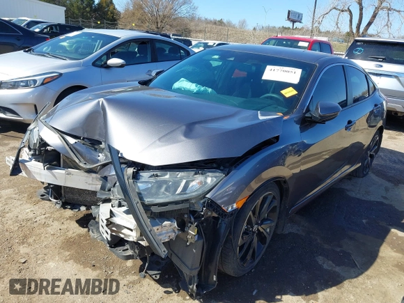 2019 Honda Civic Sport with VIN 19XFC2F82KE019704, listed as a IAAI auction lot 41770051 with 90,011 mi miles and . Bid and sale history available at DreamBid. Image 17.