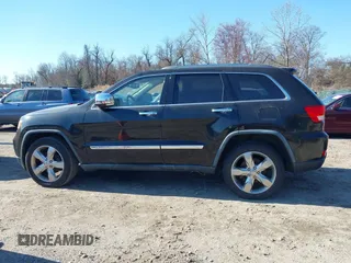 2011 Jeep Grand Cherokee Overland with VIN 1J4RS6GGXBC659349, listed as a IAAI auction lot 41778399 with 219,624 mi miles and . Bid and sale history available at DreamBid. Image 14.