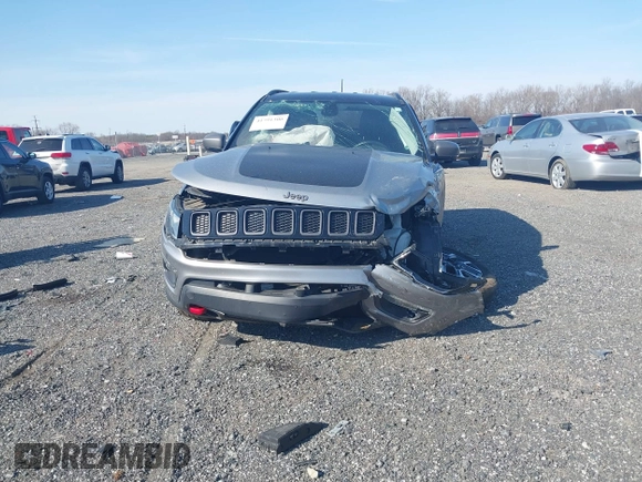 2020 Jeep Compass Trailhawk with VIN 3C4NJDDBXLT106663, listed as a IAAI auction lot 41791300 with 74,162 mi miles and . Bid and sale history available at carsss.com. Image 12.