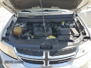 2012 Dodge Journey SXT z VIN 3C4PDDBG3CT360536, wystawiony jako Copart lot #57483455 z przebiegiem 135 278 mil mil oraz Czysty tytuł • Clean title. Historia ofert i sprzedaży dostępna na DreamBid. Obrazek 12.