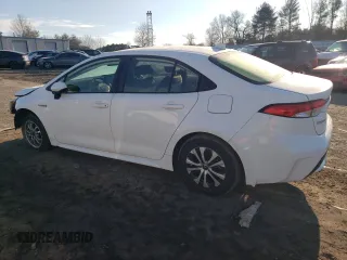 2021 Toyota Corolla Hybrid LE with VIN JTDEAMDE5MJ011169, listed as a Copart auction lot 88752265 with 52,994 mi miles and Salvage Title. Bid and sale history available at carsss.com. Image 2.