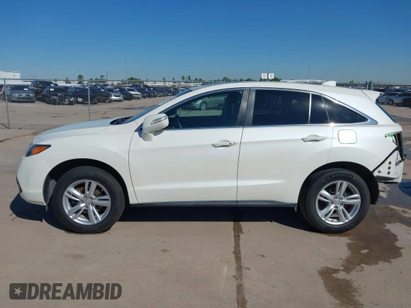 2014 Acura RDX Tech Pkg with VIN 5J8TB3H59EL014382, listed as a IAAI auction lot 41649885 with 104,542 mi miles. Bid and sale history available at carsss.com. Image 15.