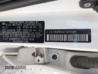 2012 Kia Rio EX with VIN KNADN5A37C6031494, listed as a IAAI auction lot 42052186 with 141,765 mi miles. Bid and sale history available at carsss.com. Image 9.