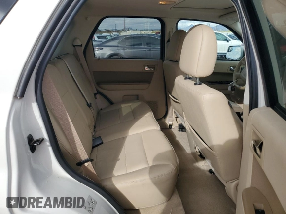 2010 Ford Escape Limited z VIN 1FMCU0EG8AKB93264, wystawiony jako Copart lot #48755805 z przebiegiem 69 141 mil mil oraz Szkoda całkowita • Salvage title. Historia ofert i sprzedaży dostępna na DreamBid. Obrazek 10.