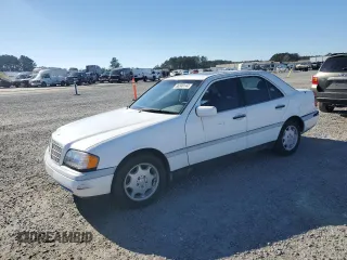1996 Mercedes-Benz C with VIN WDBHA28E8TF389546, listed as a Copart auction lot 86340144 with 314,364 mi miles and Salvage Title. Bid and sale history available at carsss.com. Image 1.