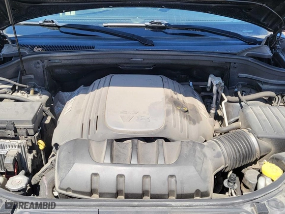 2014 Jeep Grand Cherokee Overland with VIN 1C4RJFCT7EC187319, listed as a Copart auction lot 53850035 with 98,314 mi miles and Clean Title. Bid and sale history available at carsss.com. Image 7.