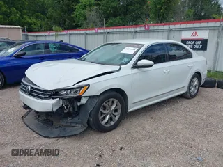 2016 Volkswagen Passat S with VIN 1VWAT7A32GC031172, listed as a IAAI auction lot 42231645 with 112,974 mi miles and . Bid and sale history available at DreamBid. Image 2.
