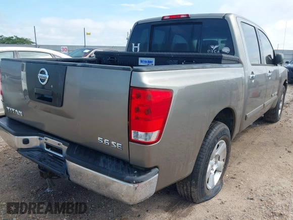 2007 Nissan Titan SE with VIN 1N6BA07A77N233436, listed as a IAAI auction lot 42562943 with 252,076 mi miles and . Bid and sale history available at DreamBid. Image 4.