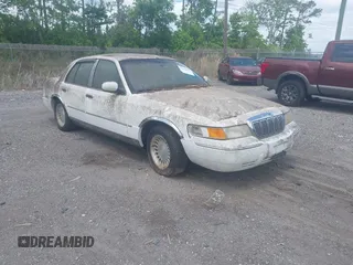 2001 Mercury Grand Marquis LS with VIN 2MEFM75WX1X633210, listed as a IAAI auction lot 42092135 with 161,963 mi miles and . Bid and sale history available at DreamBid. Image 1.