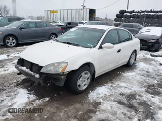 2004 Nissan Altima S with VIN 1N4AL11D64C137926, listed as a IAAI auction lot 41571445 with 124,147 mi miles. Bid and sale history available at carsss.com. Image 18.