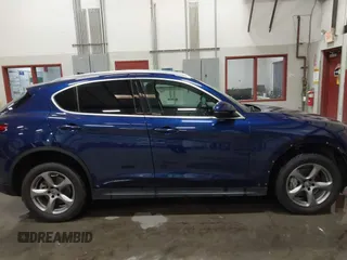 2018 Alfa Romeo Stelvio z VIN ZASFAKAN6J7B74782, wystawiony jako IAAI lot #41939007 z przebiegiem 48 210 mil mil oraz . Historia ofert i sprzedaży dostępna na DreamBid. Obrazek 14.