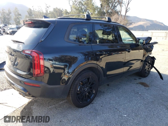 2022 Kia Telluride SX with VIN 5XYP5DHC0NG242472, listed as a Copart auction lot 43958185 with 57,604 mi miles and Salvage title. Bid and sale history available at DreamBid. Image 3.