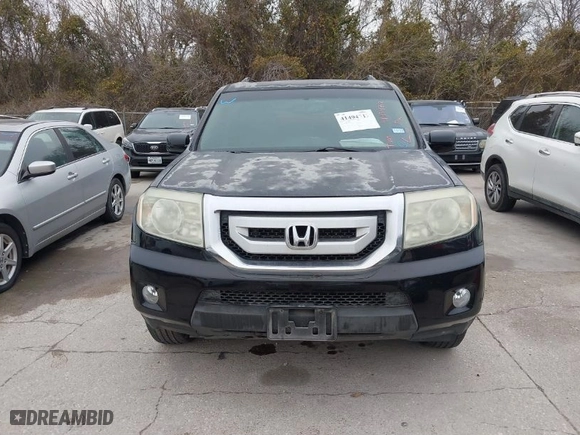 2010 Honda Pilot Touring with VIN 5FNYF4H89AB034007, listed as a IAAI auction lot 41494712 with 318,710 mi miles. Bid and sale history available at carsss.com. Image 12.