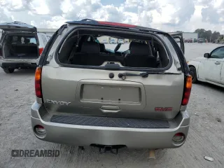 2002 GMC Envoy SLT with VIN 1GKDT13SX22380133, listed as a Copart auction lot 69816144 with 90,060 mi miles and Salvage Title. Bid and sale history available at DreamBid. Image 6.