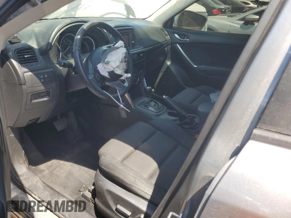 2014 Mazda CX-5 Touring z VIN JM3KE2CY7E0349484, wystawiony jako Copart lot #51188665 z przebiegiem 175 131 mil mil oraz Szkoda całkowita • Salvage title. Historia ofert i sprzedaży dostępna na DreamBid. Obrazek 7.