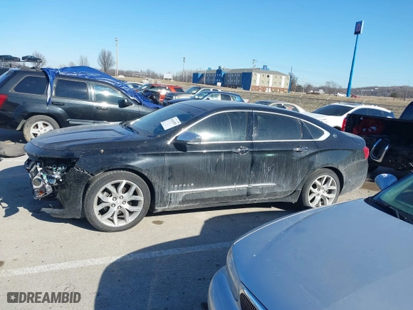 2014 Chevrolet Impala LTZ with VIN 2G1155S31E9105694, listed as a IAAI auction lot 41414595 with 128,828 mi miles. Bid and sale history available at carsss.com. Image 15.