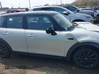 2016 MINI Hardtop 4 Door z VIN WMWXU1C54G2A93779, wystawiony jako IAAI lot #41933339 z przebiegiem 85 000 mil mil oraz . Historia ofert i sprzedaży dostępna na DreamBid. Obrazek 13.