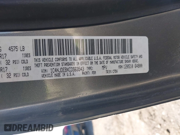 2012 Jeep Compass Latitude with VIN 1C4NJDEBXCD563543, listed as a IAAI auction lot 41711187 with 149,100 mi miles. Bid and sale history available at carsss.com. Image 9.