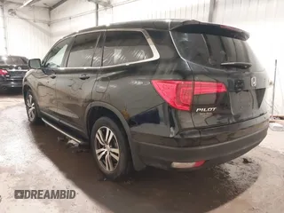 2018 Honda Pilot EX-L z VIN 5FNYF6H82JB014516, wystawiony jako IAAI lot #41615682 z przebiegiem 87 067 mil mil oraz . Historia ofert i sprzedaży dostępna na DreamBid. Obrazek 3.