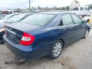 2004 Toyota Camry LE with VIN 4T1BF30K44U069441, listed as a IAAI auction lot 41740124 with 145,906 mi miles. Bid and sale history available at carsss.com. Image 4.