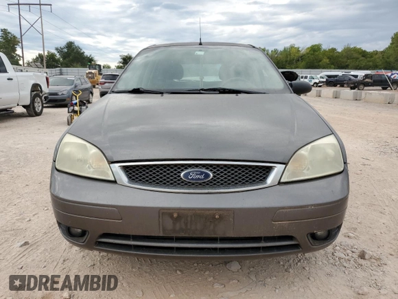2007 Ford Focus S with VIN 1FAHP37N07W331532, listed as a Copart auction lot 71894104 with 183,909 mi miles and Clean Title. Bid and sale history available at carsss.com. Image 5.