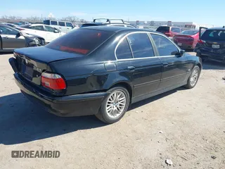 2001 BMW 5 Series 530iA with VIN WBADT634X1CF04145, listed as a IAAI auction lot 41651022 with 190,069 mi miles. Bid and sale history available at carsss.com. Image 4.