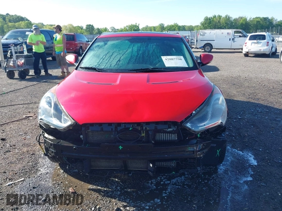 2013 Hyundai Veloster Turbo z VIN KMHTC6AE3DU169229, wystawiony jako IAAI lot #42087798 z przebiegiem 120 741 mil mil oraz . Historia ofert i sprzedaży dostępna na DreamBid. Obrazek 12.