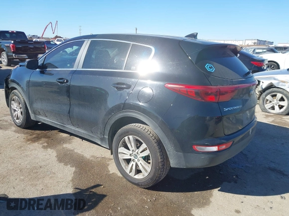 2019 Kia Sportage LX with VIN KNDPM3AC4K7534271, listed as a IAAI auction lot 41696261 with 71,386 mi miles. Bid and sale history available at carsss.com. Image 3.