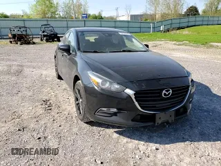 2017 Mazda 3 Touring with VIN 3MZBN1L78HM132387, listed as a Copart auction lot 56658705 with 123,507 mi miles and Salvage title. Bid and sale history available at DreamBid. Image 13.