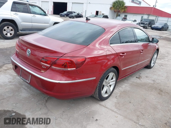 2014 Volkswagen CC Sport with VIN WVWBN7AN0EE527558, listed as a IAAI auction lot 41336204 with 130,005 mi miles and . Bid and sale history available at DreamBid. Image 4.