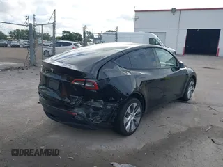 2023 Tesla Model Y Long Range with VIN 7SAYGDEE2PA044328, listed as a IAAI auction lot 42427625 with 41,324 mi miles and . Bid and sale history available at DreamBid. Image 4.