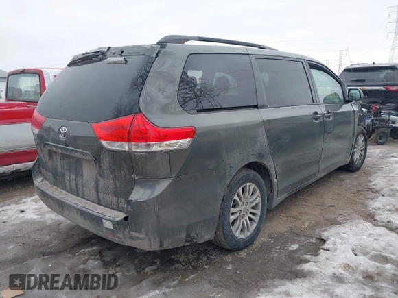 2012 Toyota Sienna XLE AAS with VIN 5TDYK3DCXCS206978, listed as a IAAI auction lot 41374061 with 307,827 mi miles and . Bid and sale history available at DreamBid. Image 4.