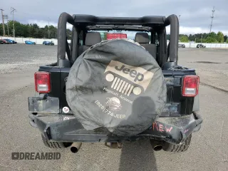 2011 Jeep Wrangler Rubicon with VIN 1J4BA6D12BL507652, listed as a Copart auction lot 69989964 with 127,493 mi miles and Salvage title. Bid and sale history available at DreamBid. Image 6.