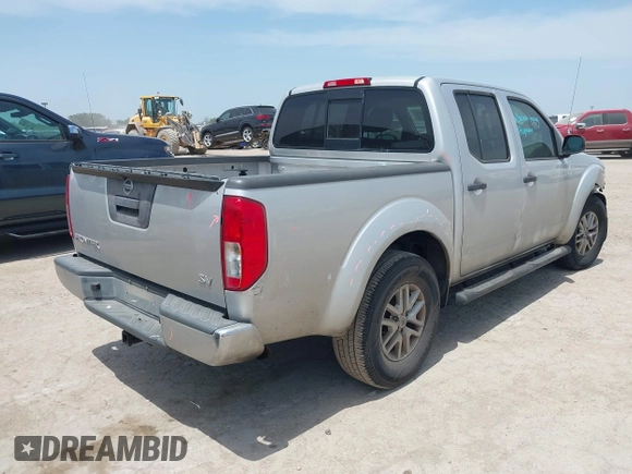 2015 Nissan Frontier SL with VIN 1N6AD0ER5FN768808, listed as a IAAI auction lot 42257992 with 151,852 mi miles and . Bid and sale history available at DreamBid. Image 4.