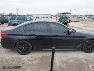 2018 BMW 5 Series M550i xDrive with VIN WBAJB9C57JB036653, listed as a IAAI auction lot 41512154 with 1 mi miles. Bid and sale history available at carsss.com. Image 12.