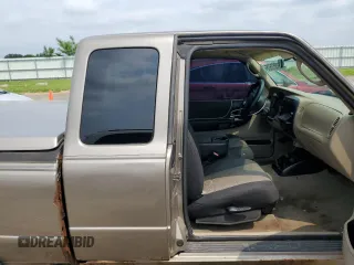 2003 Ford Ranger XL Fleet z VIN 1FTZR45E13PB20412, wystawiony jako Copart lot #60357605 z przebiegiem 190 398 mil mil oraz Czysty tytuł • Clean title. Historia ofert i sprzedaży dostępna na DreamBid. Obrazek 10.