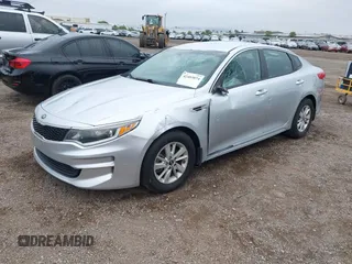 2017 Kia Optima LX z VIN 5XXGT4L31HG175841, wystawiony jako IAAI lot #42403874 z przebiegiem 94 269 mil mil oraz . Historia ofert i sprzedaży dostępna na DreamBid. Obrazek 2.