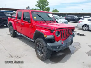 2023 Jeep Gladiator Rubicon z VIN 1C6JJTBG2PL509200, wystawiony jako IAAI lot #42326449 z przebiegiem Nie podano mil oraz . Historia ofert i sprzedaży dostępna na DreamBid. Obrazek 1.