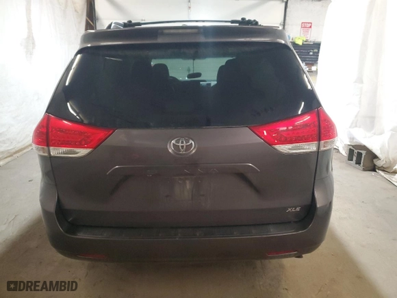 2012 Toyota Sienna XLE AAS with VIN 5TDYK3DC6CS263811, listed as a Copart auction lot 52485765 with 0 mi miles and Salvage Title. Bid and sale history available at carsss.com. Image 6.